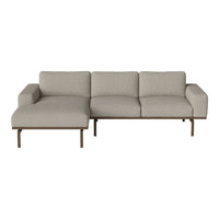 Light gray fabric sectional sofa with clean lines and modern design, featuring a minimalist style.