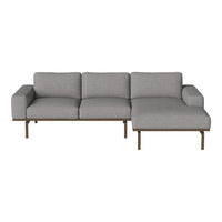 Modern gray sectional sofa with clean lines and a minimalist design, featuring a solid wood frame.