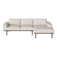 Light beige sectional sofa with a minimalist design and subtle texture. Perfect for modern living spaces.