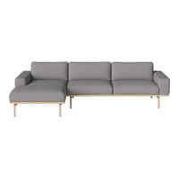 Modern gray sectional sofa with a sleek design and natural wood legs, perfect for contemporary living spaces.