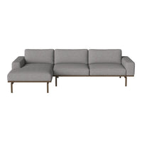 Gray fabric sectional sofa with a sleek design and minimalistic metal legs. Ideal for modern decor.