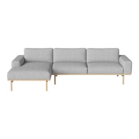 Modern gray sectional sofa with a sleek wooden base, featuring clean lines and minimalist design. Perfect for contemporary spaces.