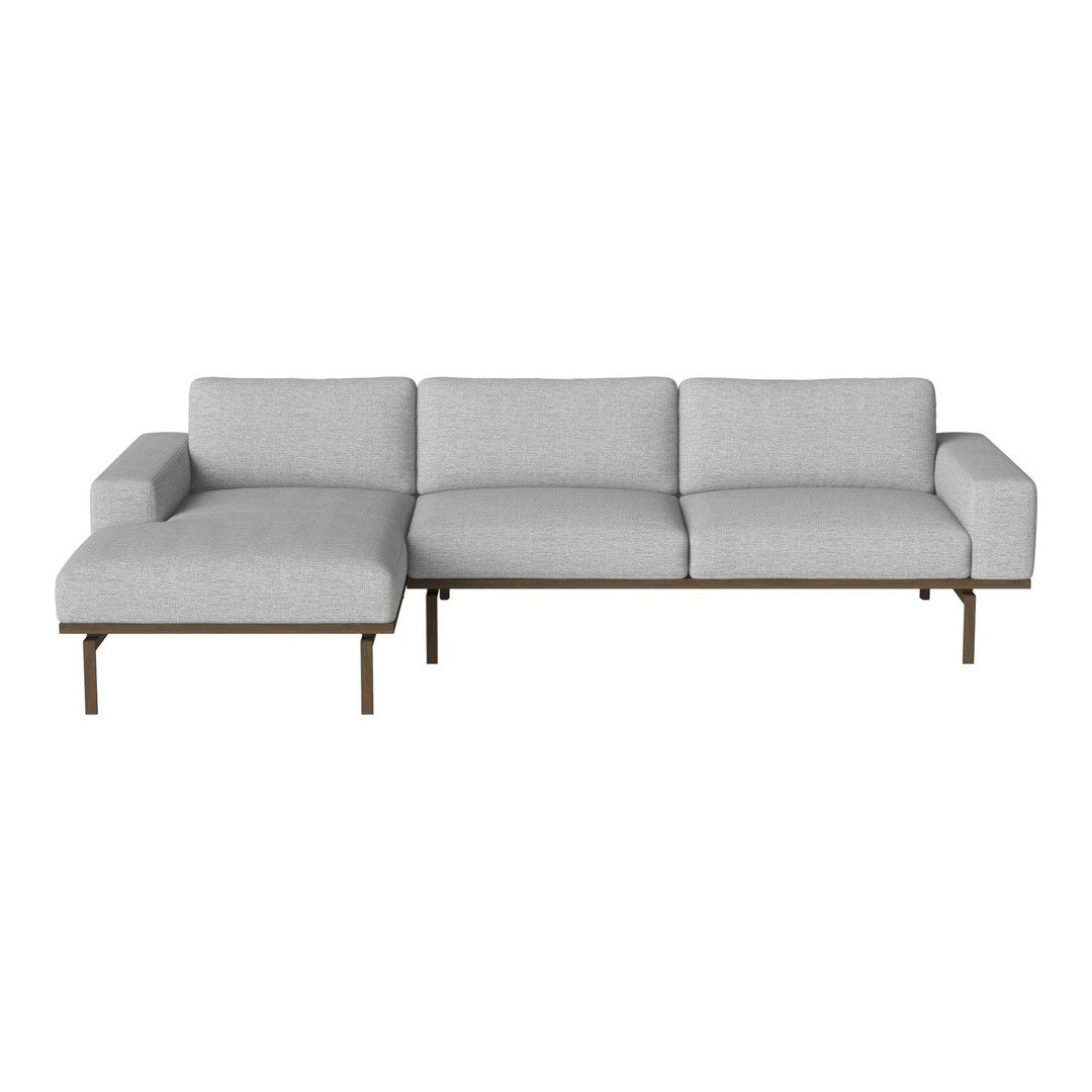 Light gray sectional sofa with clean lines and a minimalist design, featuring a modern metal frame.