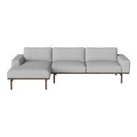 Light gray sectional sofa with clean lines and a minimalist design, featuring a modern metal frame.