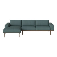 Modern teal sectional sofa with a minimalist design and smooth fabric, featuring a sleek metal frame.