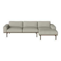 Light gray sectional sofa with a minimalist design and sleek, neutral tones. Modern style perfect for any living space.