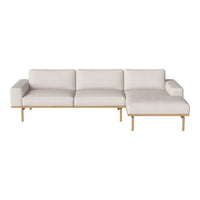 Light beige sectional sofa with a minimalist design and natural wood legs, perfect for modern interiors.
