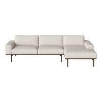 Light beige sectional sofa with a minimalist design and clean lines, featuring a smooth fabric texture.