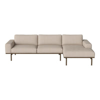 Light beige sectional sofa with clean lines and a smooth, minimalist design. Perfect for modern living spaces.