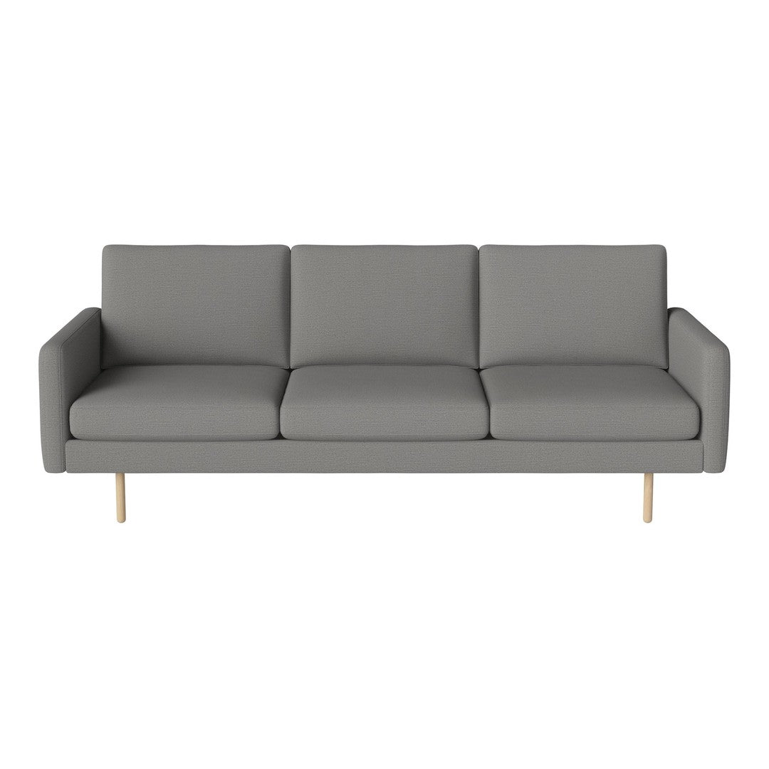 Gray three-seater sofa with smooth fabric and wooden legs, featuring a minimalist design for modern decor.