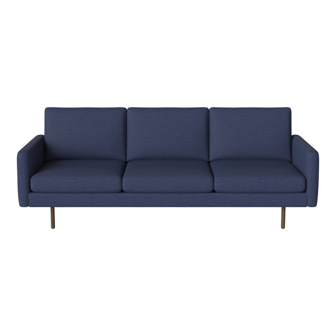 Navy blue sofa with a smooth texture and minimalist design, featuring straight lines and solid color upholstery.