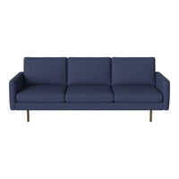 Navy blue sofa with a smooth texture and minimalist design, featuring straight lines and solid color upholstery.