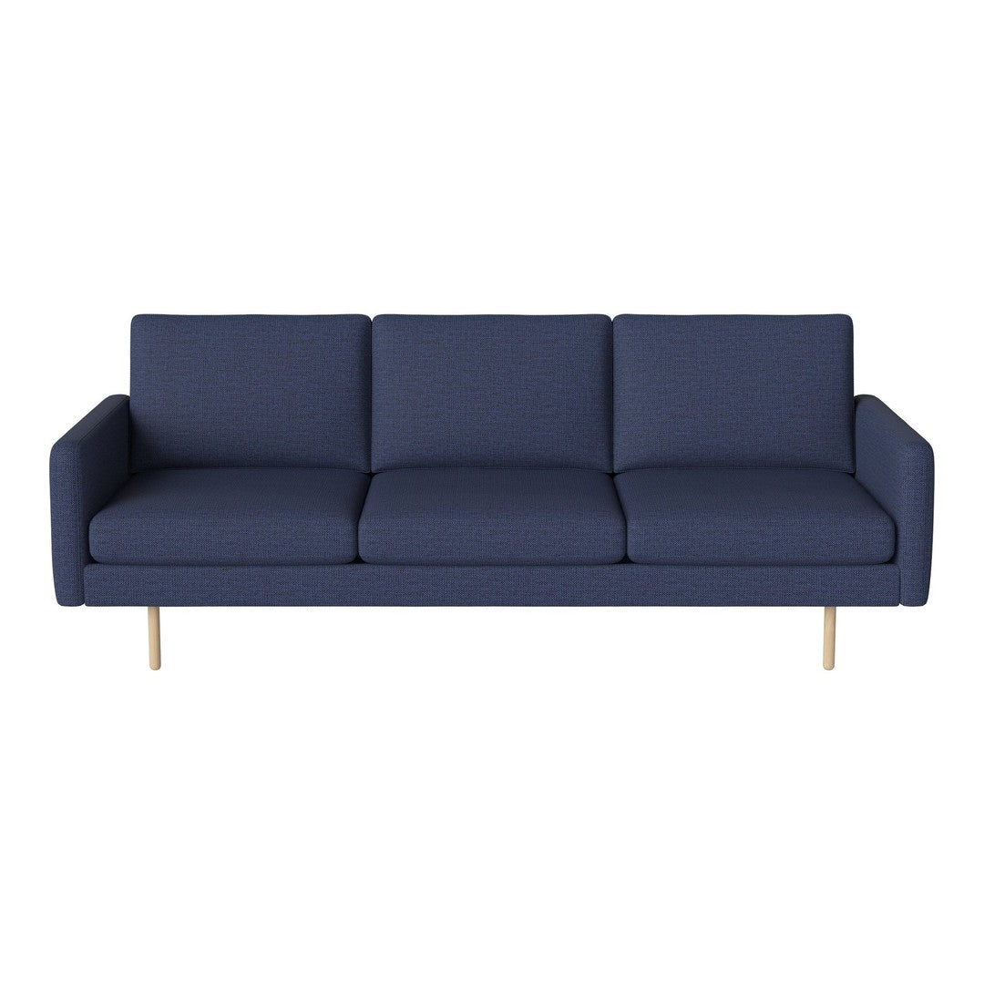 Navy blue sofa with a clean, modern design and three plush seats, featuring crisp lines and gold legs.
