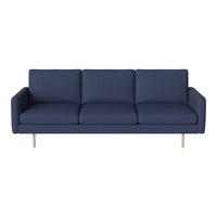 Navy blue sofa with a clean, modern design and three plush seats, featuring crisp lines and gold legs.