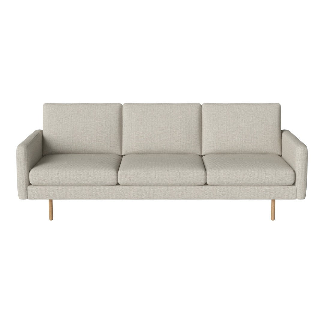 Stylish light gray sofa with clean lines and minimalist design, featuring smooth fabric cushions and wooden legs.