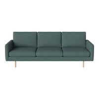 Teal three-seat sofa with a subtle textured pattern and wooden legs, perfect for modern living spaces.