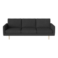 Sleek charcoal gray sofa with a minimalist design and clean lines, featuring a solid color and no visible patterns.