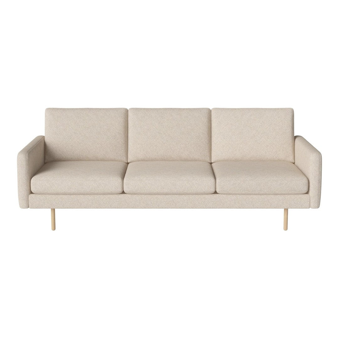 Beige three-seat sofa with minimalist design and subtle textured upholstery, complemented by light wood legs.