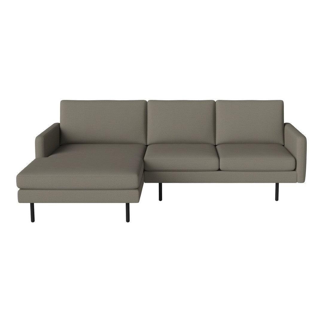 Modern sectional sofa in muted gray fabric with clean lines and minimalist design. Perfect for contemporary living spaces.