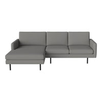 Modern gray sectional sofa with clean lines and a minimalist design, perfect for contemporary decor.