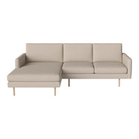 Light beige sectional sofa with clean lines and minimalistic design. Ideal for modern living spaces.