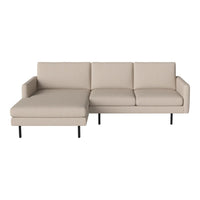 Beige sectional sofa with clean lines, featuring a smooth, minimalist design and black metal legs. Perfect for modern decor.