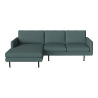 Dark teal sectional sofa with a sleek, textured fabric and modern minimalist design. Perfect for stylish living spaces.
