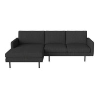 Modern dark gray sectional sofa with a sleek fabric texture and minimalist design. Perfect for contemporary living spaces.
