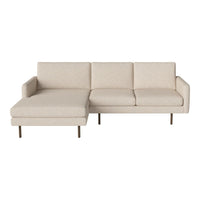 Beige sectional sofa with a smooth fabric finish and sleek, minimalist design. Perfect for modern interiors.