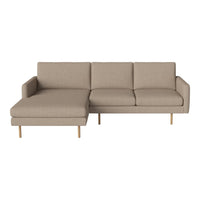 Beige fabric sectional sofa with clean lines and wooden legs, perfect for modern living spaces.