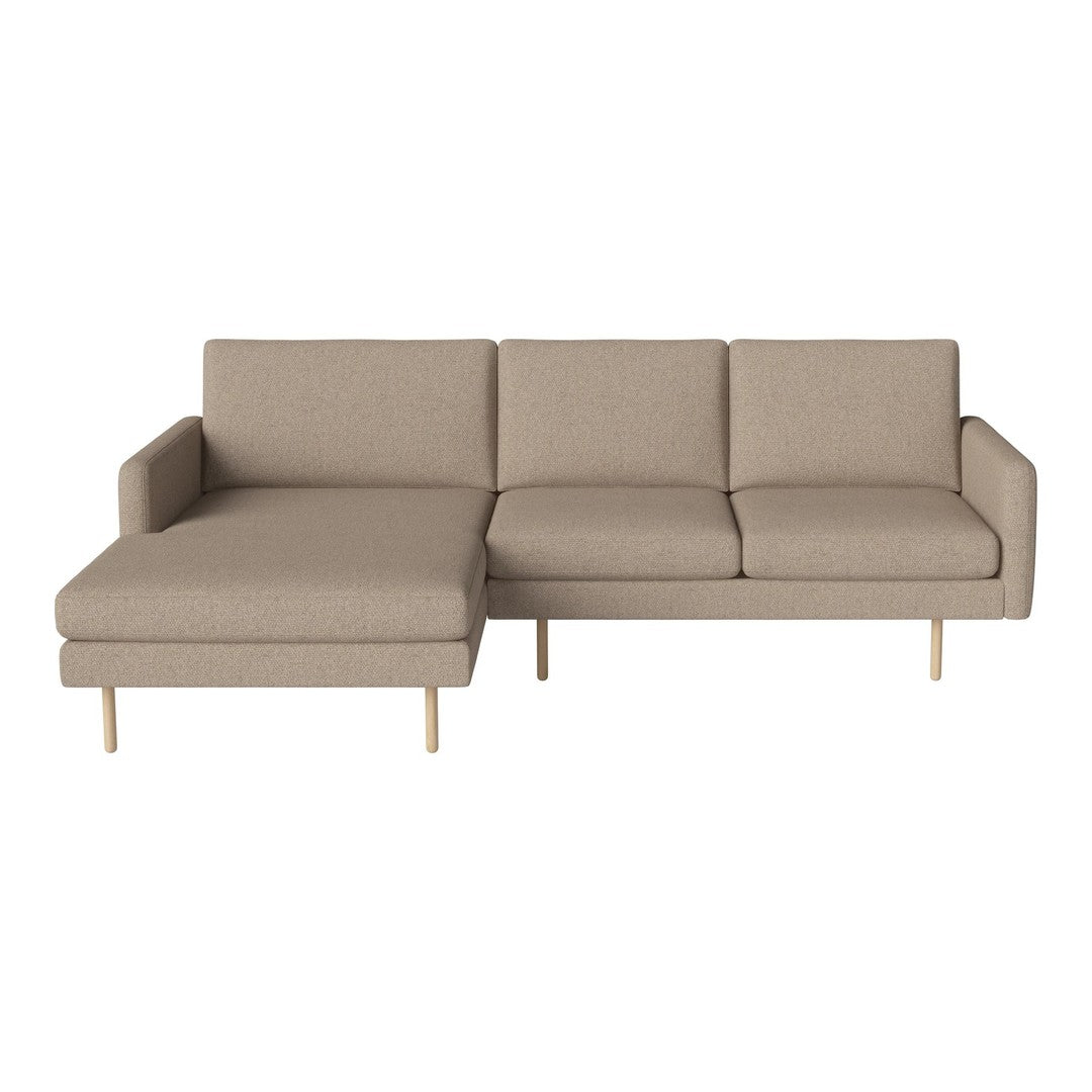 Beige upholstered sectional sofa with a simple, modern design and light wooden legs. Perfect for contemporary living rooms.