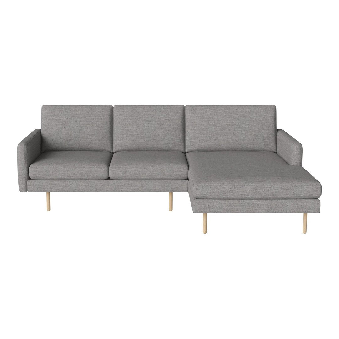 Gray sectional sofa with smooth fabric, minimalist design, and light wooden legs, perfect for modern living spaces.