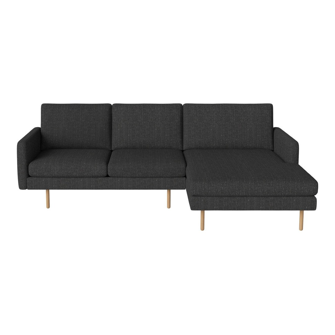 Modern dark gray sectional sofa with a sleek design and subtle textured pattern on fabric. Ideal for contemporary decor.
