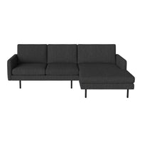 Modern dark gray sectional sofa with a sleek, minimalist design and textured fabric upholstery.