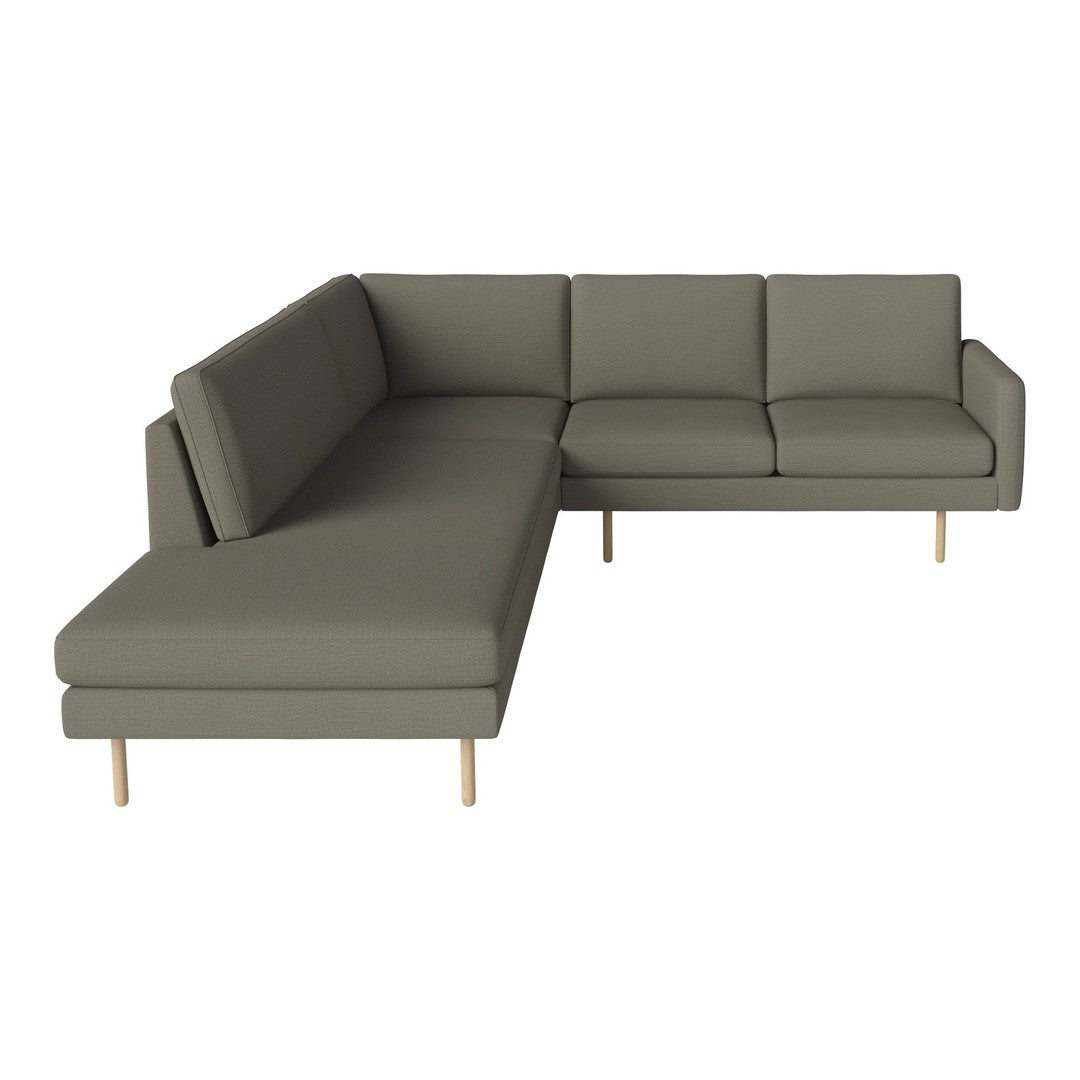Gray sectional sofa with a sleek design and light wooden legs; modern and versatile for any interior decor.