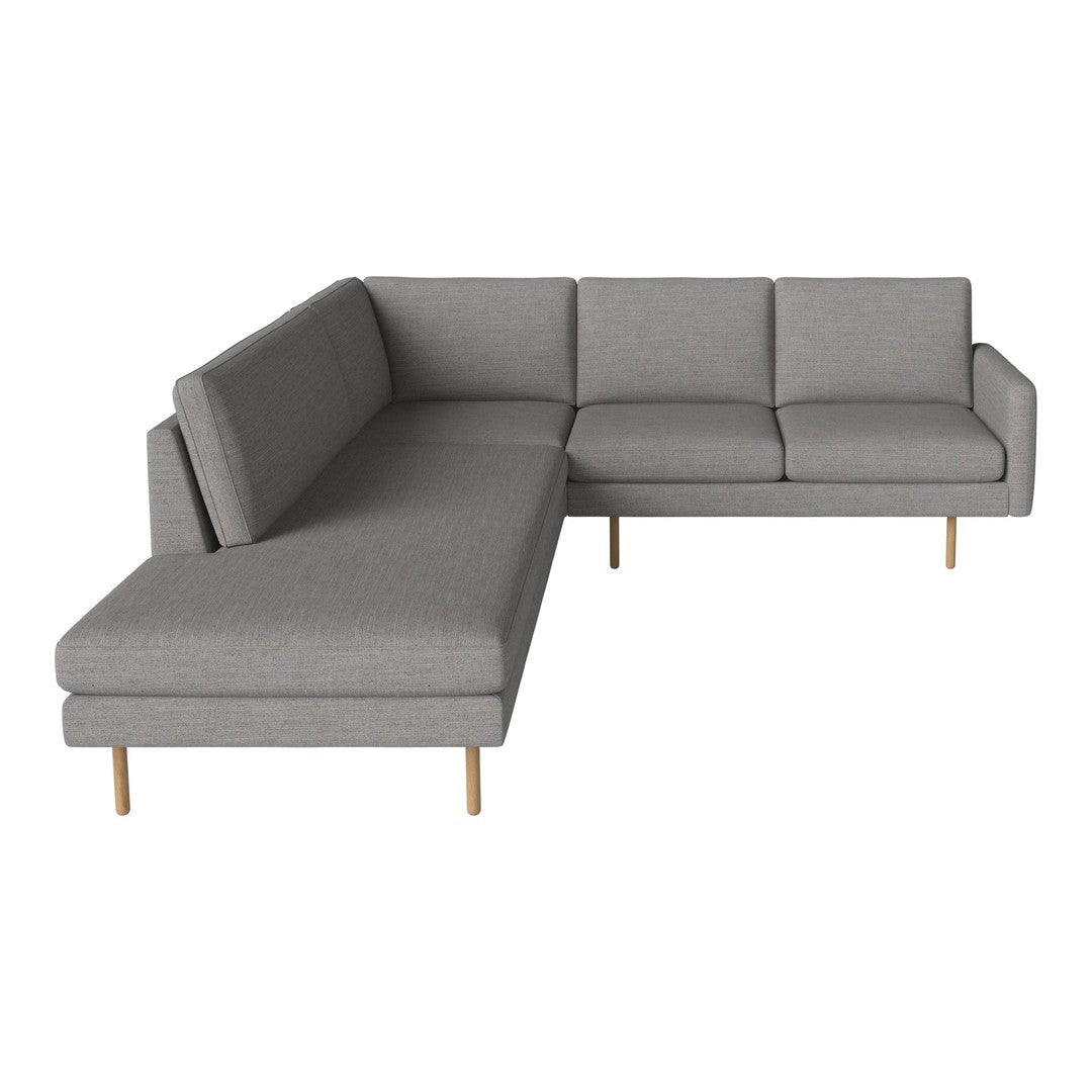 Gray sectional sofa with clean lines and subtle texture, featuring light wooden legs. Ideal for modern living spaces.