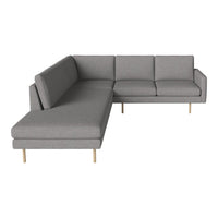 Gray fabric sectional sofa with clean lines and minimalist design, featuring light wooden legs for a modern touch.