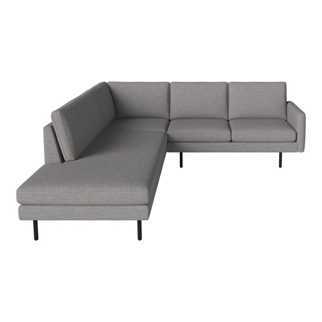Gray sectional sofa with clean lines and textured fabric, featuring a modern design and minimalist style.