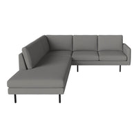 Gray sectional couch with a simple, modern design and clean lines, featuring a solid color finish.
