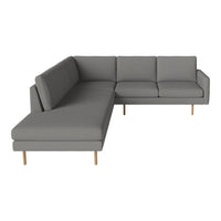 Modern gray sectional sofa with clean lines and soft upholstery, featuring natural wood legs for a sleek contrast.