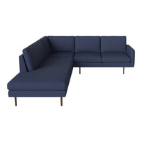 Dark navy blue sectional sofa with clean lines and solid fabric, featuring a modern design and sleek metal legs.