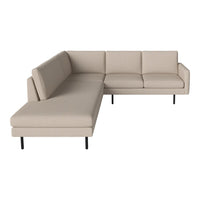 Beige sectional sofa with clean lines and minimalistic design, featuring solid color upholstery and sleek black legs.