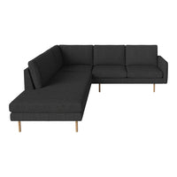 Modern dark gray sectional sofa with clean lines and wooden legs, perfect for contemporary living spaces.