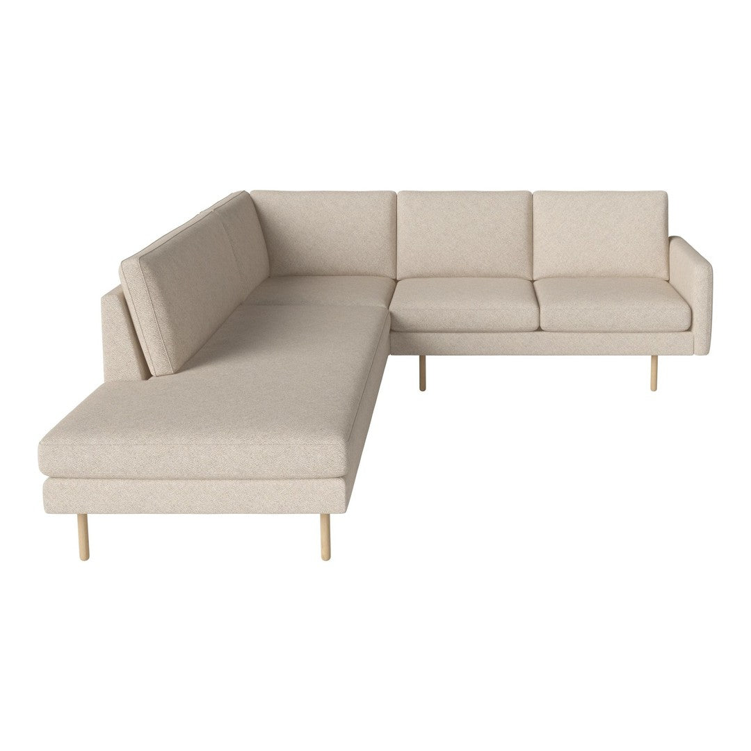 Beige L-shaped sofa with a smooth fabric texture and gold-colored legs, perfect for modern living spaces.