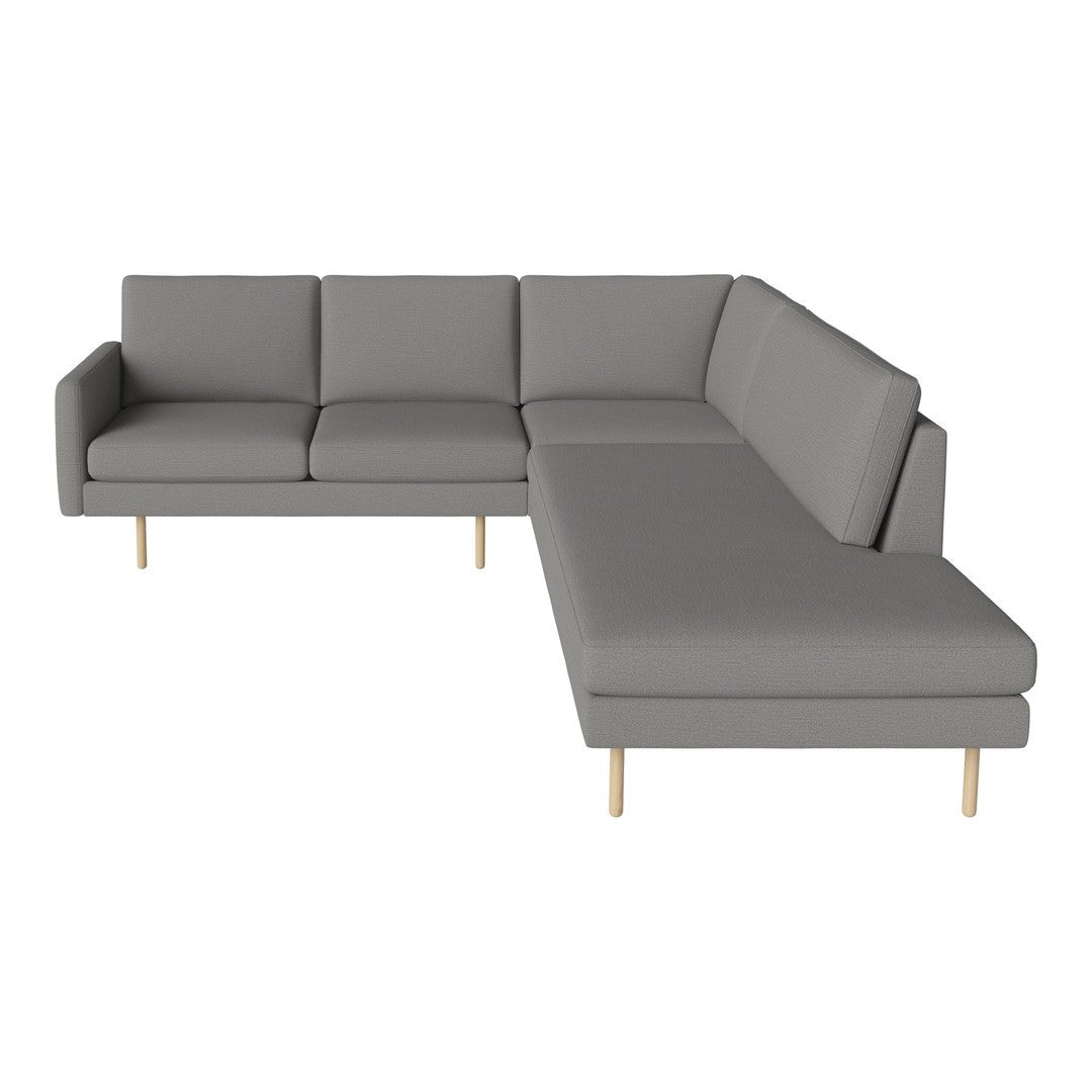 Gray sectional sofa with clean lines and minimalist design, featuring light wooden legs. Perfect for modern decor.