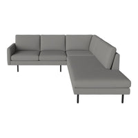 Stylish gray sectional sofa with clean lines and modern design, featuring a sleek, minimalist aesthetic.