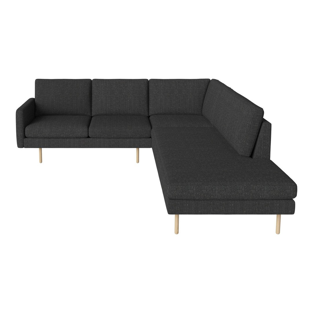 Dark grey sectional sofa with a modern pattern and light wooden legs, ideal for contemporary living spaces.
