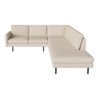 Beige sectional sofa with a smooth, minimalist design and subtle texture, perfect for modern living spaces.