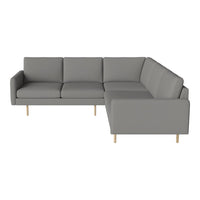 Stylish gray sectional sofa with sleek lines and wooden legs, perfect for modern living spaces.