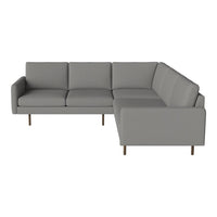 Gray sectional sofa with smooth fabric and modern design, featuring clean lines and minimalistic style.